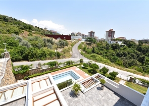 تصميم عصري حديث- شقة 2 غرفة وصالة - تراس واسع -مجمع 5نجوم -جيكجلي / الانيا 