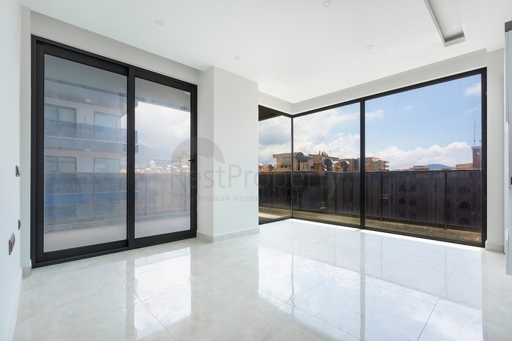 ضمن مجمع فاخر -اول صف على البحر - شقة غرفتين وصالة - مهموتلار / الانيا 