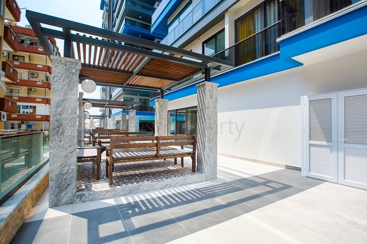 ضمن مجمع فاخر -اول صف على البحر - شقة غرفتين وصالة - مهموتلار / الانيا 