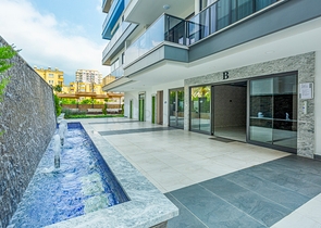 ضمن مجمع فاخر -اول صف على البحر - شقة غرفتين وصالة - مهموتلار / الانيا 