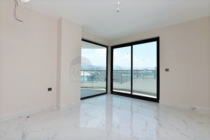 اطلالة بحر وجبل - شقة ضمن مجمع حديث - تصميم 1+2 -مهموتلار / الانيا 