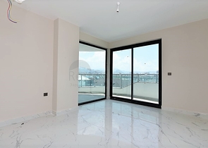 اطلالة بحر وجبل - شقة ضمن مجمع حديث - تصميم 1+2 -مهموتلار / الانيا 