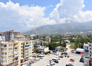 اطلالة بحر وجبل - شقة ضمن مجمع حديث - تصميم 1+2 -مهموتلار / الانيا 