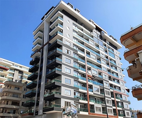 شقة انيقة -تصميم 1+2 - ضمن مجمع جديد - مهموتلار / الانيا 