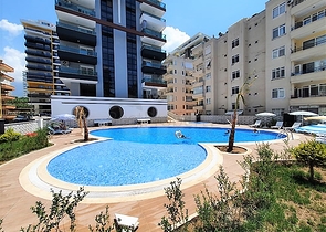 شقة انيقة -تصميم 1+2 - ضمن مجمع جديد - مهموتلار / الانيا 