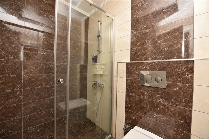 مجمع بخدمات ممتازة - شقة غرفة وصالة مفروشة - في منطقة توسمور/ الانيا 