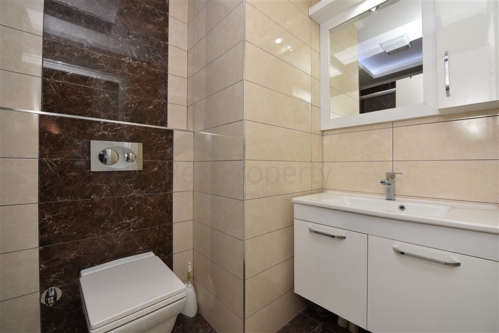 مجمع بخدمات ممتازة - شقة غرفة وصالة مفروشة - في منطقة توسمور/ الانيا 