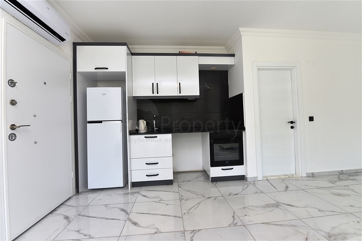 سعر مناسب - شقة غرفة وصالة مفروشة -ضمن مجمع حديث -افسلار / الانيا 