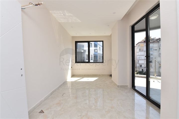 شقة ضمن مجمع حديث - تصميم 1+2 - مطبخ منفصل- مركز الانيا 