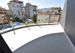 شقة ضمن مجمع حديث - تصميم 1+2 - مطبخ منفصل- مركز الانيا 