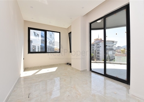 شقة ضمن مجمع حديث - تصميم 1+2 - مطبخ منفصل- مركز الانيا 