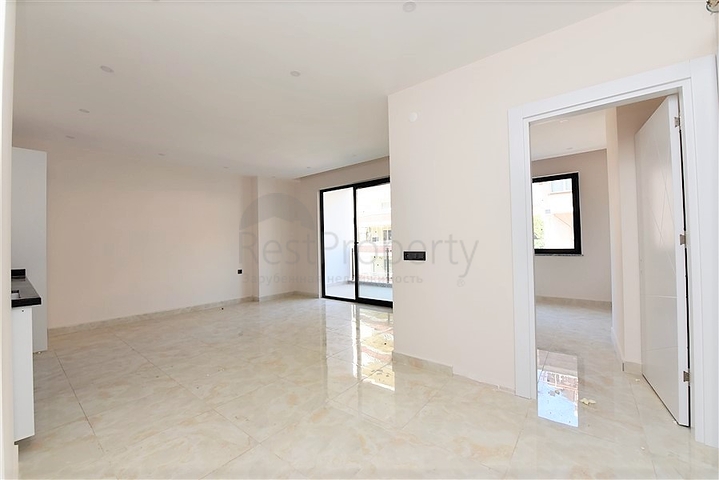 شقة غرفتين وصالة - ضمن مجمع حديث - في مركز الانيا 