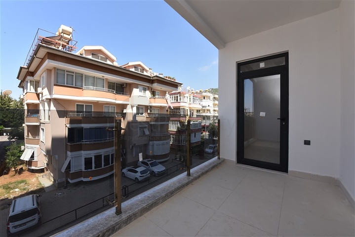 شقة غرفتين وصالة - ضمن مجمع حديث - في مركز الانيا 