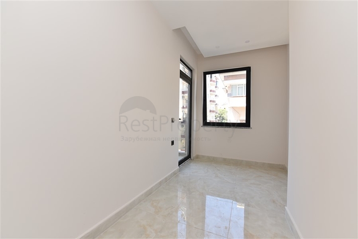 شقة غرفتين وصالة - ضمن مجمع حديث - في مركز الانيا 