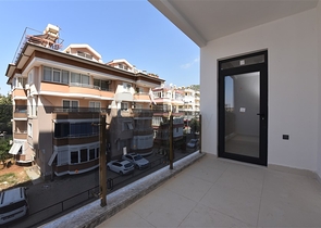 شقة غرفتين وصالة - ضمن مجمع حديث - في مركز الانيا 