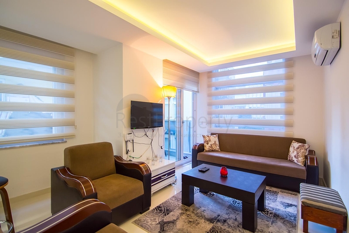 في مركز الانيا - بعيدة 150 متر عن البحر - شقة 1+1- مناسبة للاستثمار 