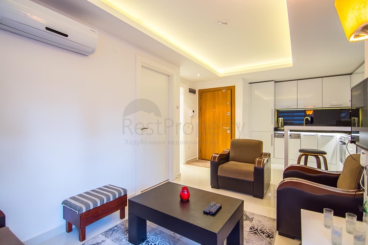 في مركز الانيا - بعيدة 150 متر عن البحر - شقة 1+1- مناسبة للاستثمار 