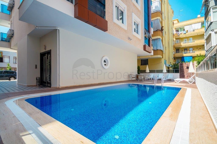 في مركز الانيا - بعيدة 150 متر عن البحر - شقة 1+1- مناسبة للاستثمار 