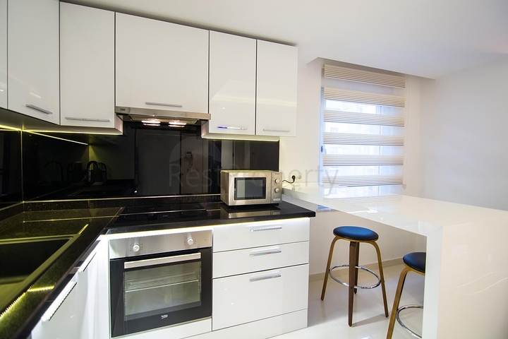 في مركز الانيا - بعيدة 150 متر عن البحر - شقة 1+1- مناسبة للاستثمار 