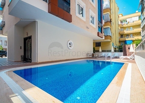 في مركز الانيا - بعيدة 150 متر عن البحر - شقة 1+1- مناسبة للاستثمار 