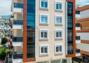 في مركز الانيا - بعيدة 150 متر عن البحر - شقة 1+1- مناسبة للاستثمار 