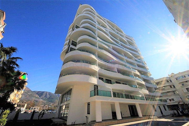 اطلالة بحر - طابق مرتفع - شقة غرفة وصالة ضمن مجمع - مهموتلار / الانيا 