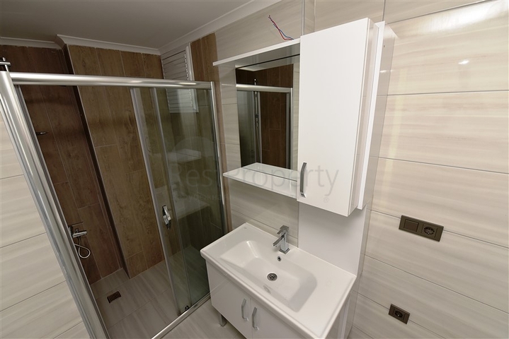 اطلالة بحر - طابق مرتفع - شقة غرفة وصالة ضمن مجمع - مهموتلار / الانيا 