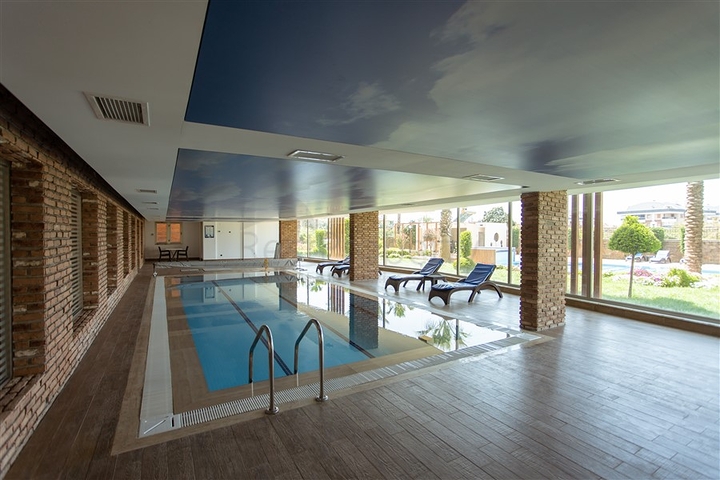 مجمع عائلي يضم كافة الخدمات -شقة فاخرة 2 غرفة وصالة - ضمن منطقة اوبا الراقية / الانيا 