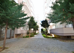 سعر منافس - شقة عائلية 2 غرفة وصالة - مطبخ منفصل - في منطقة مهموتلار / الانيا 