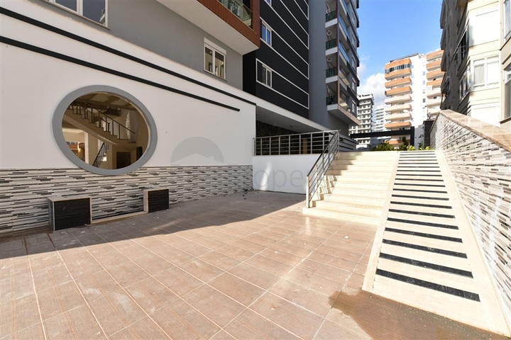 اطلالة بحر - طابق مرتفع -شقة غرفة وصالة ضمن مجمع سكني حديث / مهموتلار / الانيا 