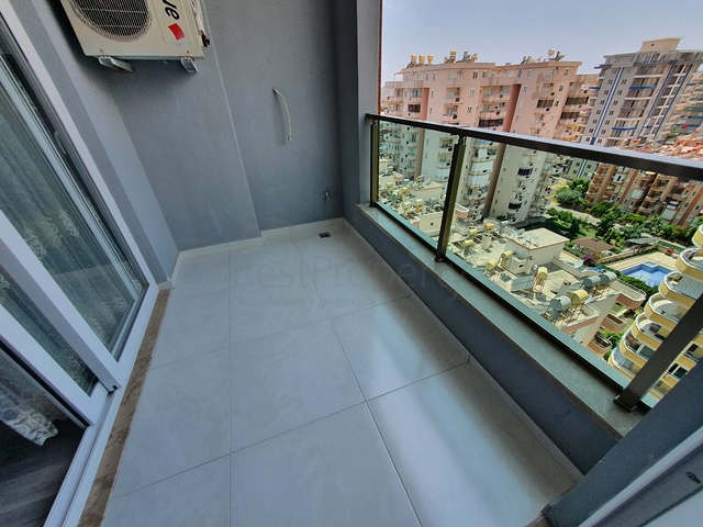 اطلالة بحر - طابق مرتفع -شقة غرفة وصالة ضمن مجمع سكني حديث / مهموتلار / الانيا 