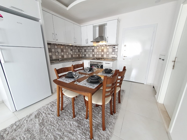 اطلالة بحر - طابق مرتفع -شقة غرفة وصالة ضمن مجمع سكني حديث / مهموتلار / الانيا 