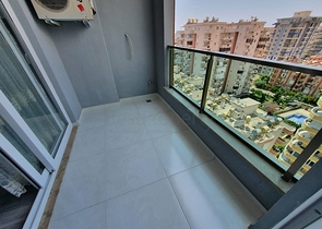 اطلالة بحر - طابق مرتفع -شقة غرفة وصالة ضمن مجمع سكني حديث / مهموتلار / الانيا 