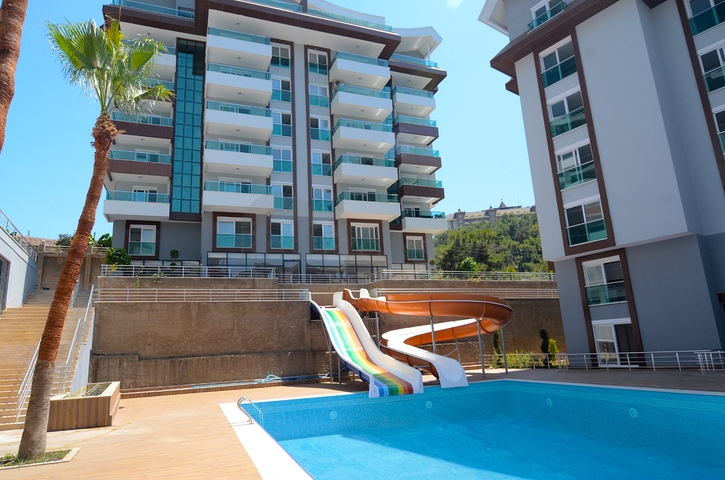 بأسعار مناسبة - شقق بتصاميم متنوعة -ضمن منطقة كارجي جاك الهادئة / الانيا 