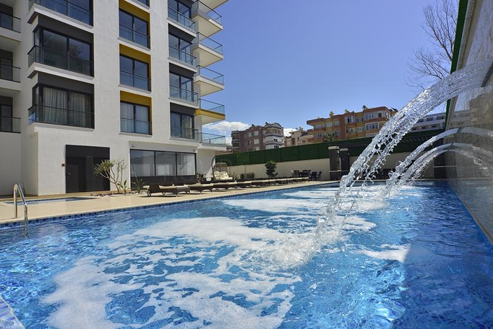 شقة مؤثثة - ضمن مجمع سكني فاخر وقريب من البحر - اوبا / الانيا 