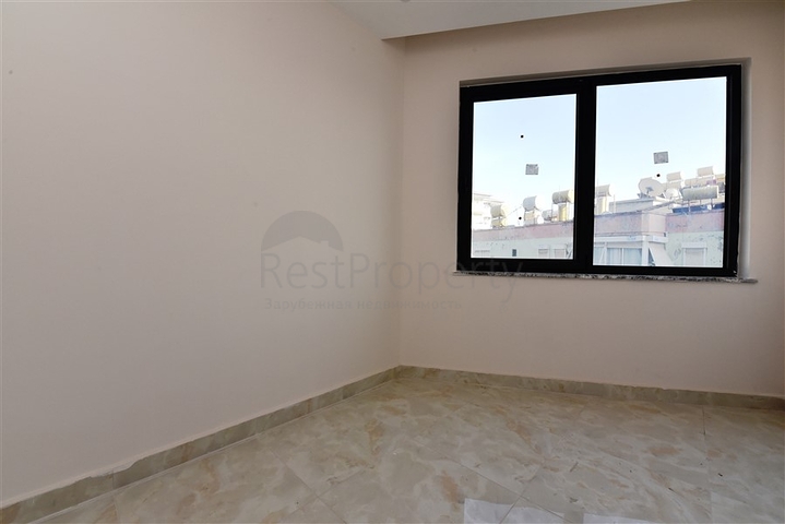 شقق ضمن مجمع سكني حديث - تصميم غرفتين وصالة - مركز الانيا 