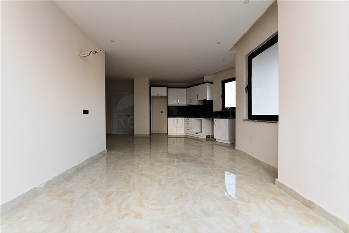 شقق ضمن مجمع سكني حديث - تصميم غرفتين وصالة - مركز الانيا 