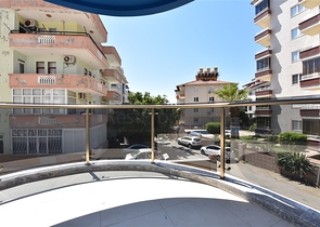 ضمن مجمع سكني حديث -شقة غرفتين وصالة -في مركز مدينة الانيا 