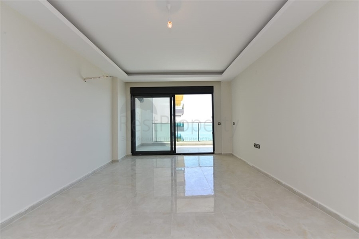 اطلالة مباشرة على البحر - شقة غرفتين وصالة ضمن مجمع حديث - مهموتلار / الانيا 