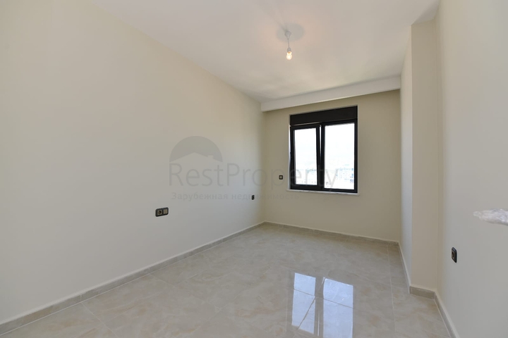 اطلالة بحر مباشرة - شقة طابق مرتفع -غرفتين وصالة -مجمع حديث /مهموتلار / الانيا 