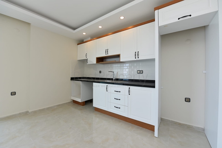 اطلالة بحر مباشرة - شقة طابق مرتفع -غرفتين وصالة -مجمع حديث /مهموتلار / الانيا 