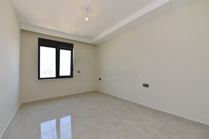 اطلالة بحر مباشرة - شقة طابق مرتفع -غرفتين وصالة -مجمع حديث /مهموتلار / الانيا 