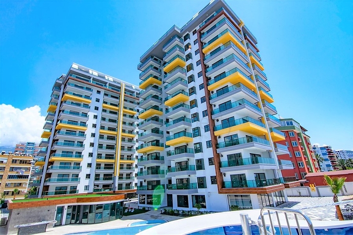 اطلالة بحر مباشرة - شقة طابق مرتفع -غرفتين وصالة -مجمع حديث /مهموتلار / الانيا 