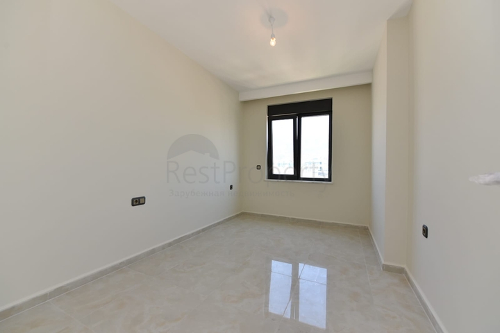 اطلالة بحر مباشرة - شقة طابق مرتفع -غرفتين وصالة -مجمع حديث /مهموتلار / الانيا 