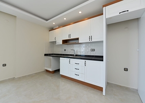 اطلالة بحر مباشرة - شقة طابق مرتفع -غرفتين وصالة -مجمع حديث /مهموتلار / الانيا 