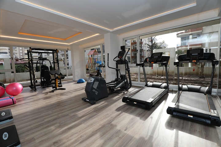 شقة مفروشة ضمن مجمع سكني حديث - تصميم 1+1 - في مهموتلار / الانيا 