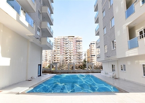 شقة مفروشة ضمن مجمع سكني حديث - تصميم 1+1 - في مهموتلار / الانيا 