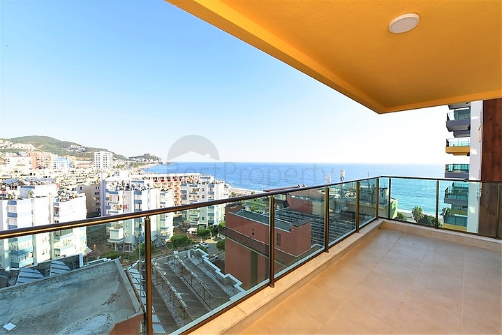 اول صف على البحر - شقة غرفتين وصالة طابق مرتفع -- مهموتلار / الانيا 