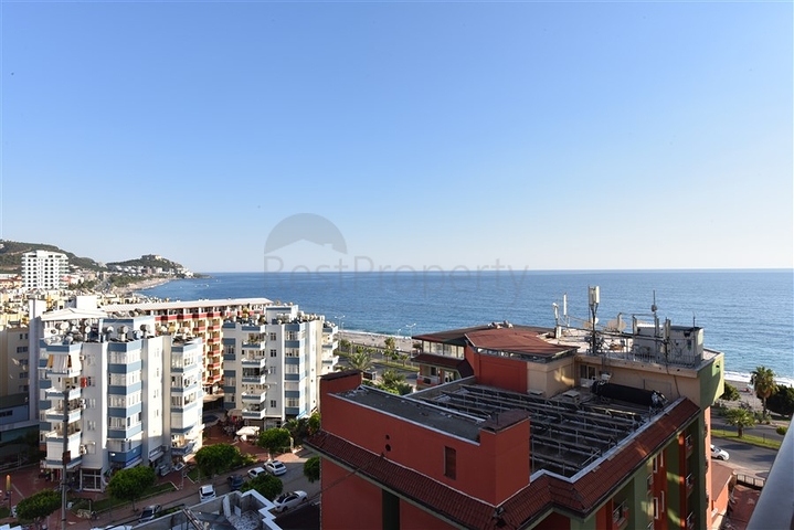 اول صف على البحر - شقة غرفتين وصالة طابق مرتفع -- مهموتلار / الانيا 