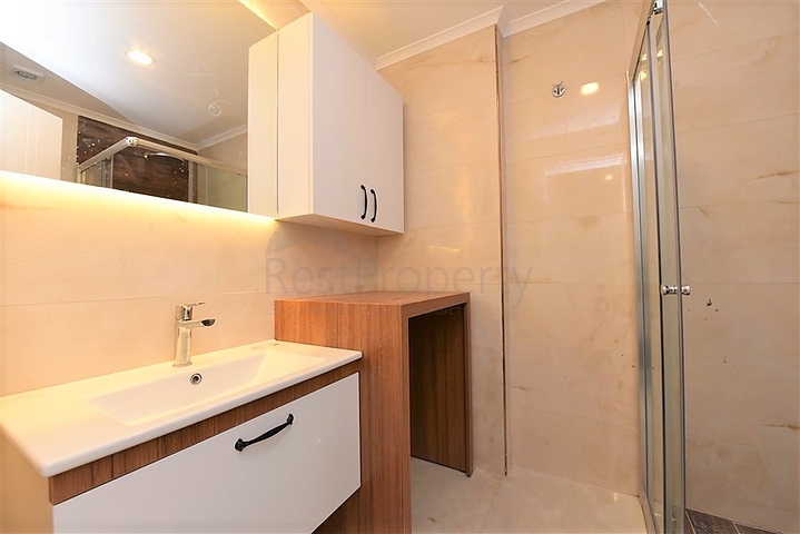 اول صف على البحر - شقة غرفتين وصالة طابق مرتفع -- مهموتلار / الانيا 